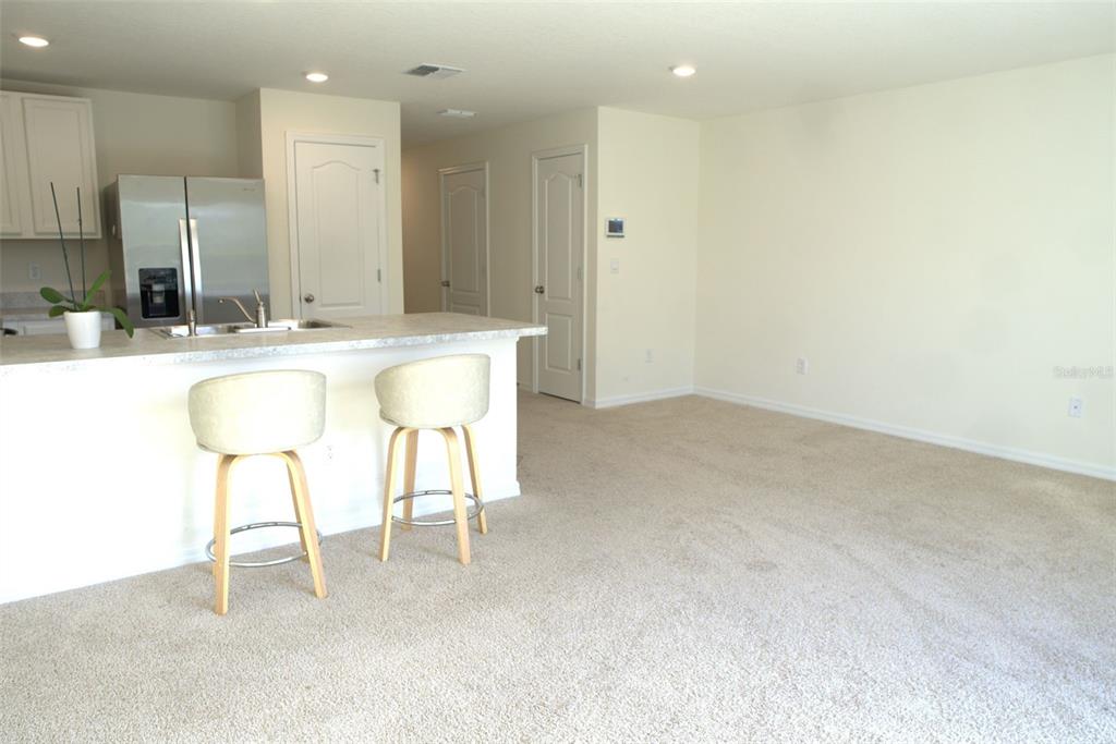 4079 Malawi Trail St. Cloud, FL 34772 - Photo 7 of 19 a bathroom with a bathtub and a sink