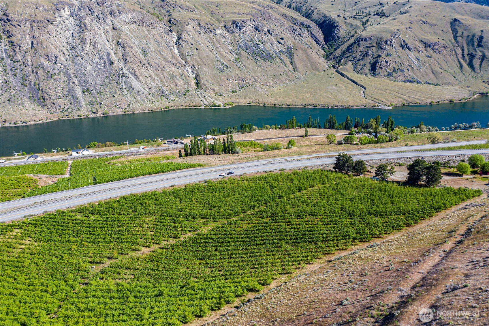 0 Us Highway Chelan, WA 98816 - Photo 11 of 40 a view of a swimming pool with a yard