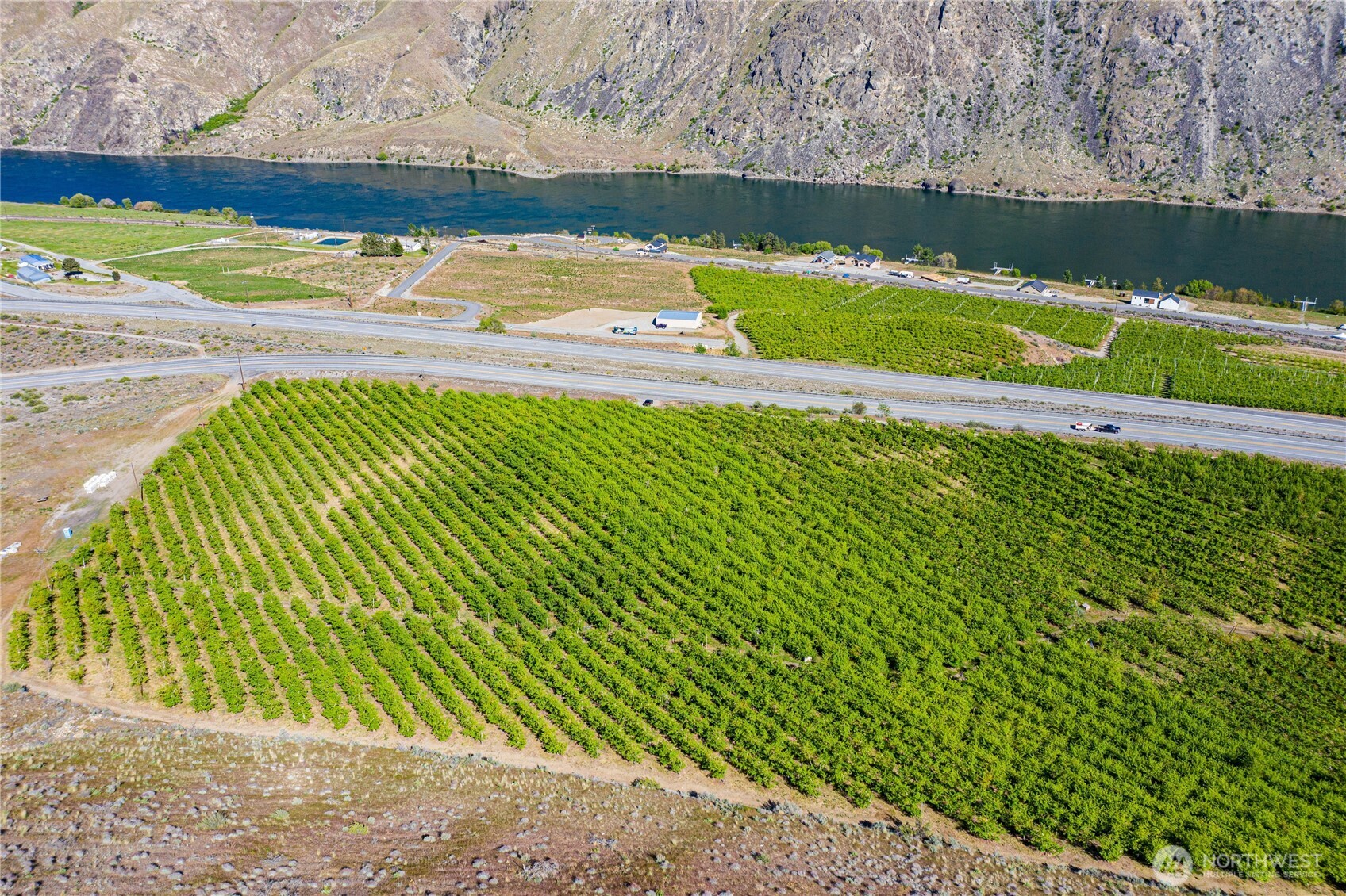 0 Us Highway Chelan, WA 98816 - Photo 12 of 40 a view of a swimming pool with a yard