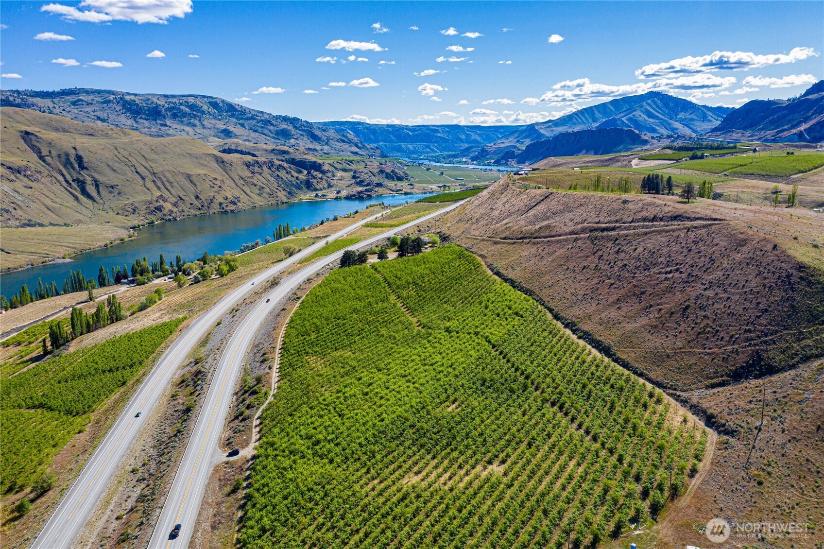 0 Us Highway Chelan, WA 98816 - Photo 10 of 40 a view of a swimming pool with a yard