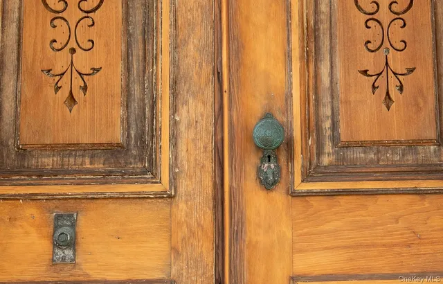a view of a door and a window