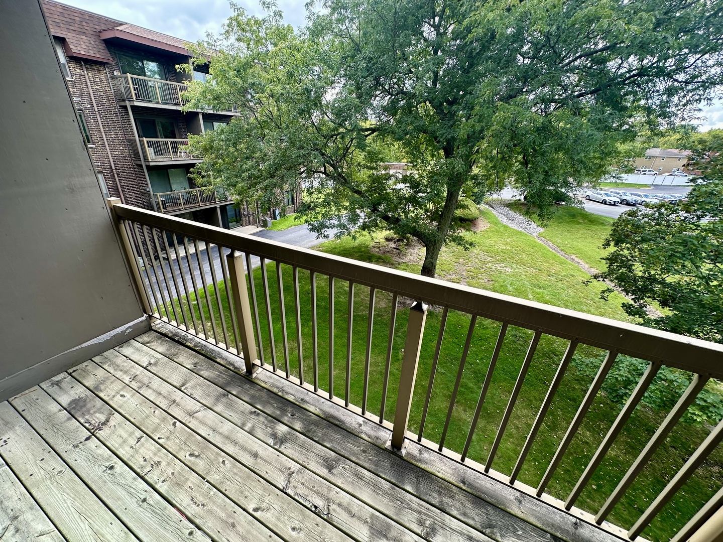 820 Elder Road, Unit C315 Homewood, IL 60430 - Photo 13 of 18 a view of balcony with wooden floor