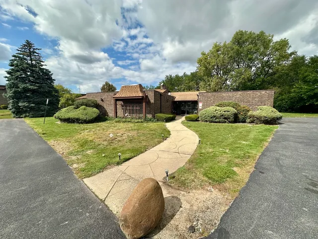 a view of backyard with green space