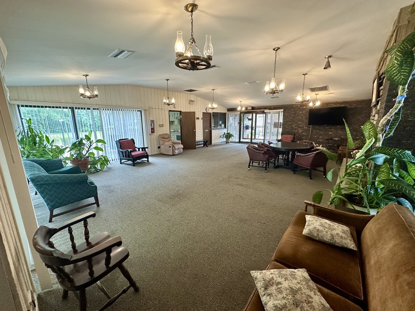 820 Elder Road, Unit C315 Homewood, IL 60430 - Photo 17 of 18 a living room with furniture and a chandelier