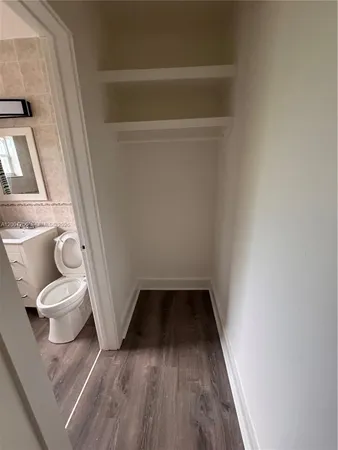 a view of a bathroom with a sink and a toilet