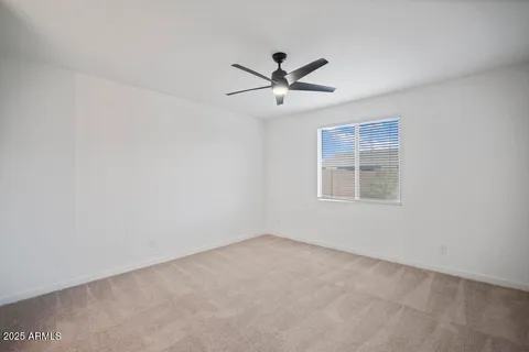 a view of a big room with carpet