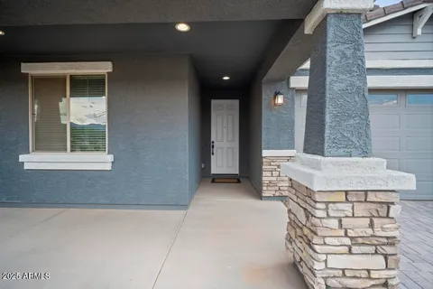 a front view of a house with garage