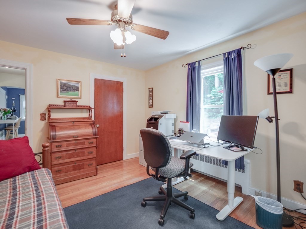 39 Echo Street Melrose, MA 02176 - Photo 14 of 32 a workspace with furniture and a window