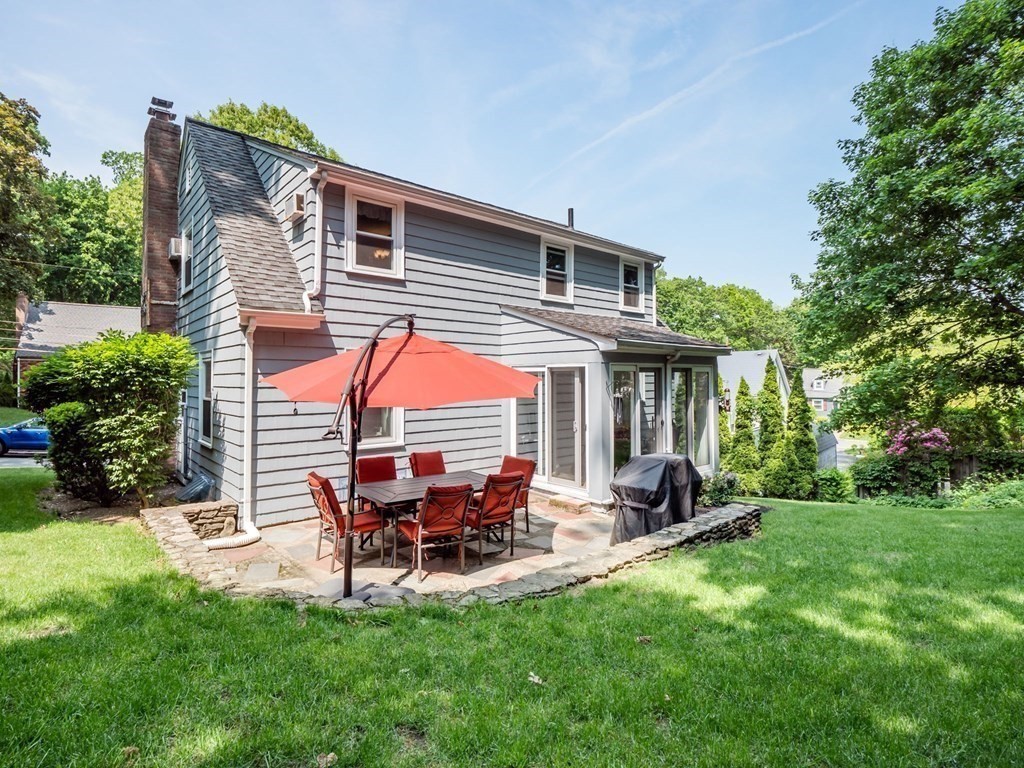 39 Echo Street Melrose, MA 02176 - Photo 25 of 32 a view of a house with a backyard and sitting area