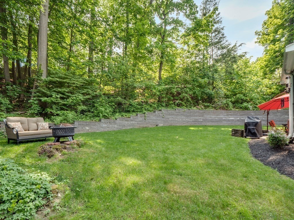 39 Echo Street Melrose, MA 02176 - Photo 29 of 32 a view of a backyard with sitting area