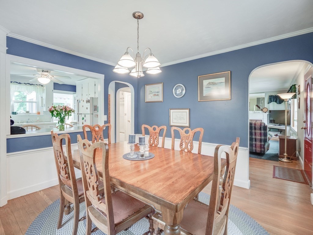 39 Echo Street Melrose, MA 02176 - Photo 4 of 32 a view of a dining room with furniture wooden floor and chandelier