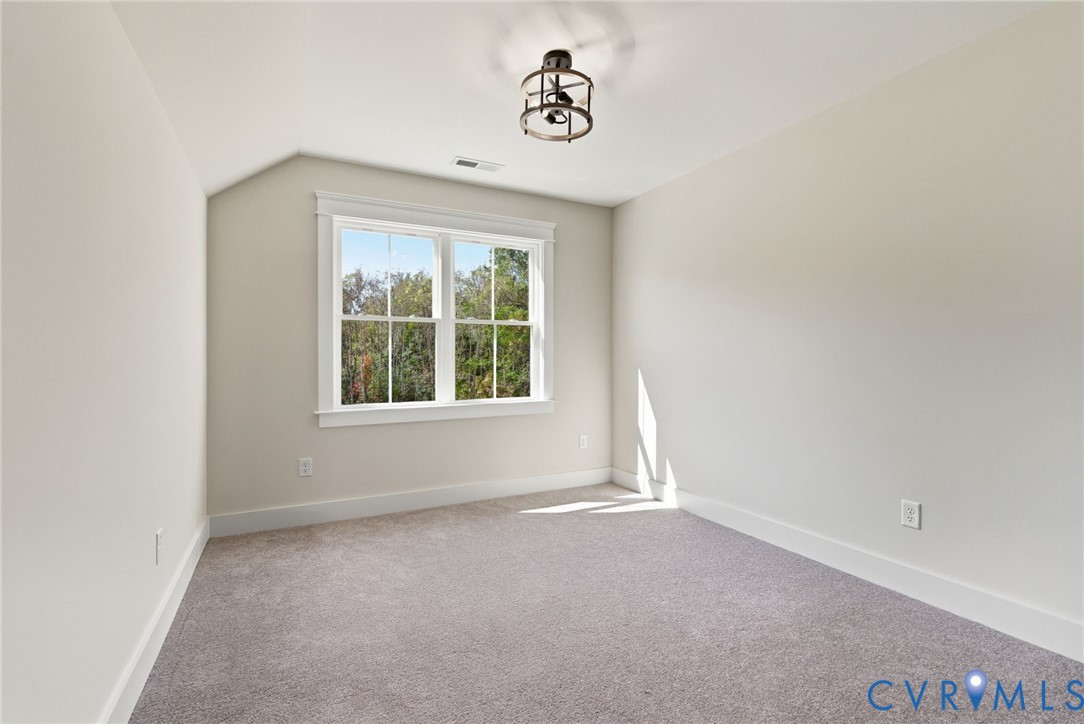 7376 River Road Hanover, VA 23069 - Photo 27 of 46 an empty room with windows