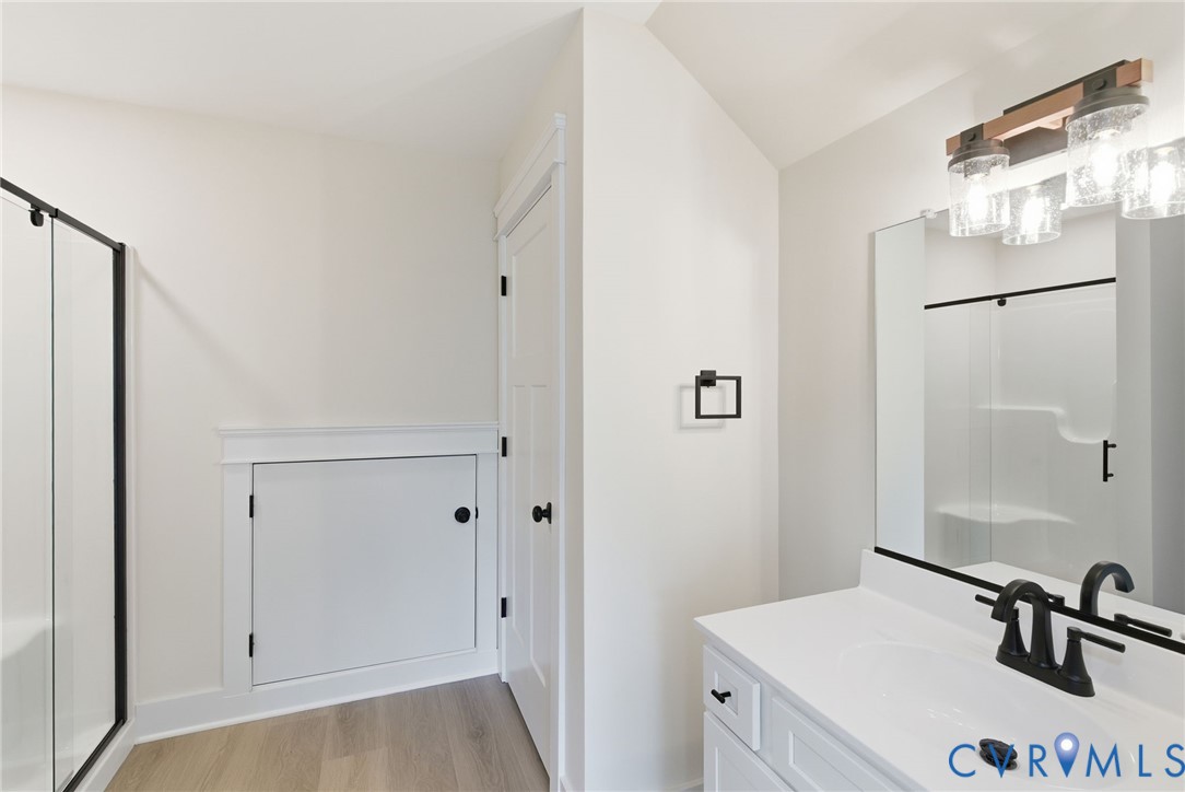 7376 River Road Hanover, VA 23069 - Photo 38 of 46 a bathroom with a sink and a mirror