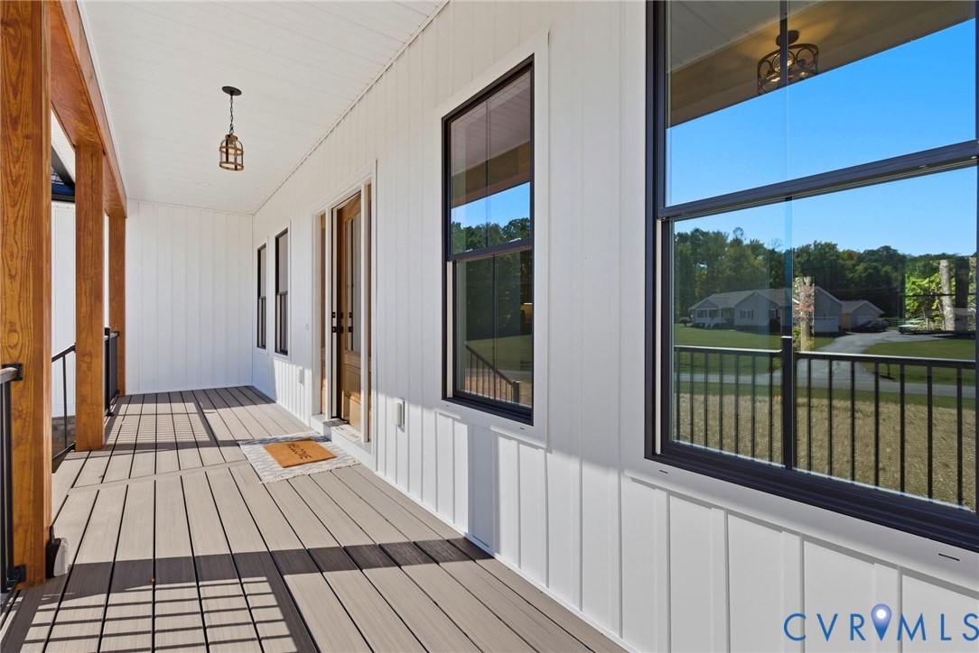 7376 River Road Hanover, VA 23069 - Photo 7 of 46 a view of balcony with wooden floor
