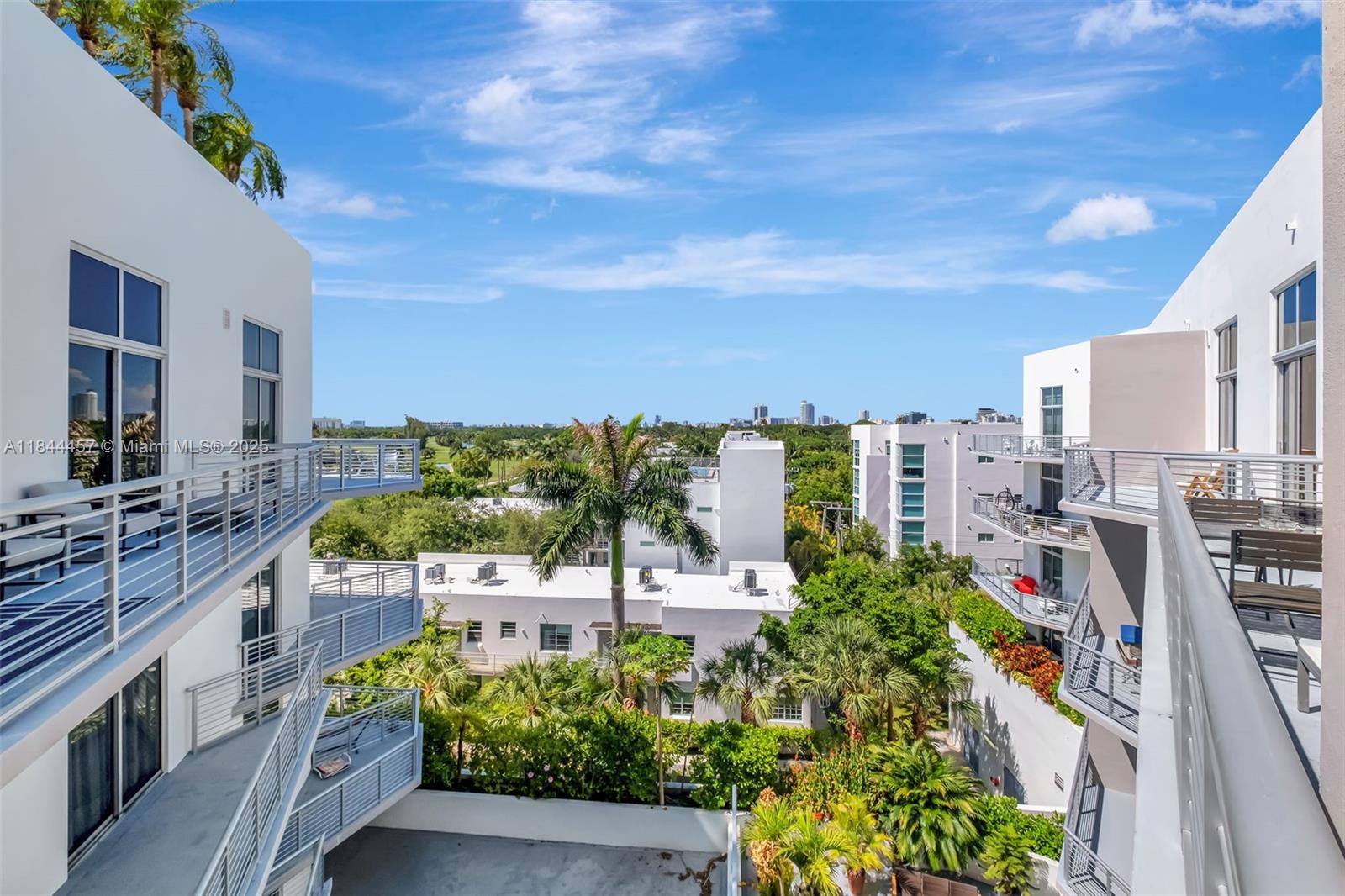 2001 Meridian Avenue, Unit PH15 Miami Beach, FL 33139 - Photo 16 of 31 a view of a balcony with chairs and a table