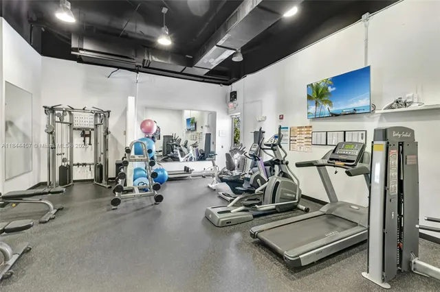 a view of a room with gym equipment