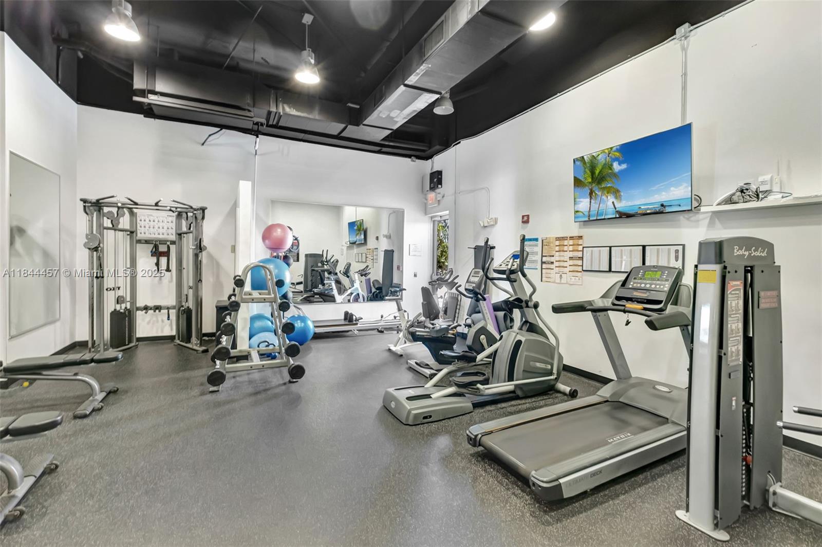 2001 Meridian Avenue, Unit PH15 Miami Beach, FL 33139 - Photo 20 of 31 a view of a room with gym equipment