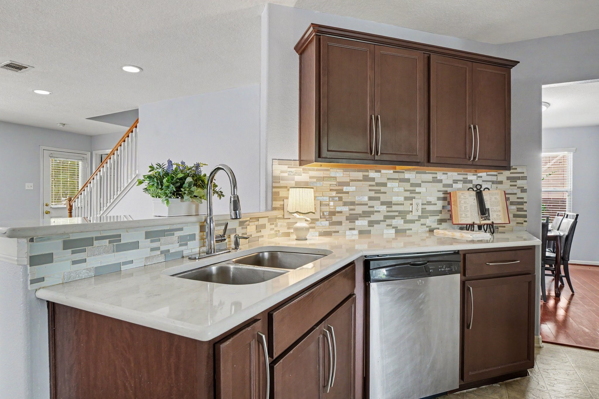 5622 Wasabi Lane Baytown, TX 77521 - Photo 6 of 29 a kitchen with a sink cabinets and window