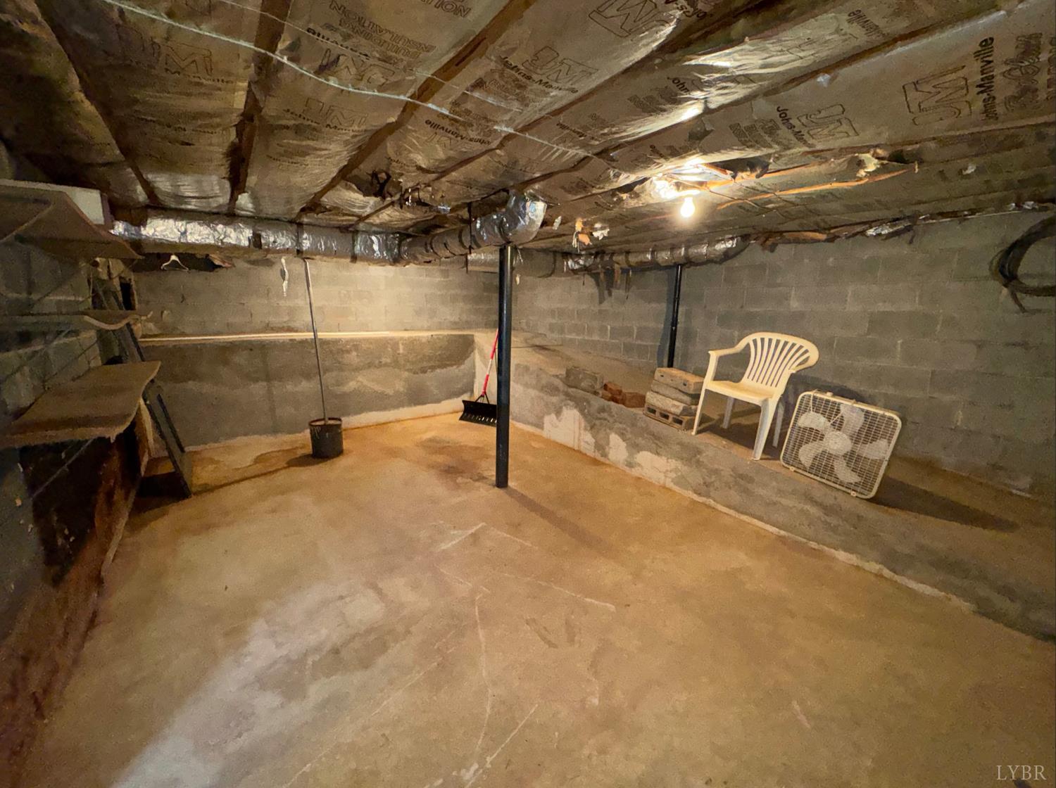 126 Rothwood Road Monroe, VA 24574 - Photo 16 of 21 a view of empty room with racks