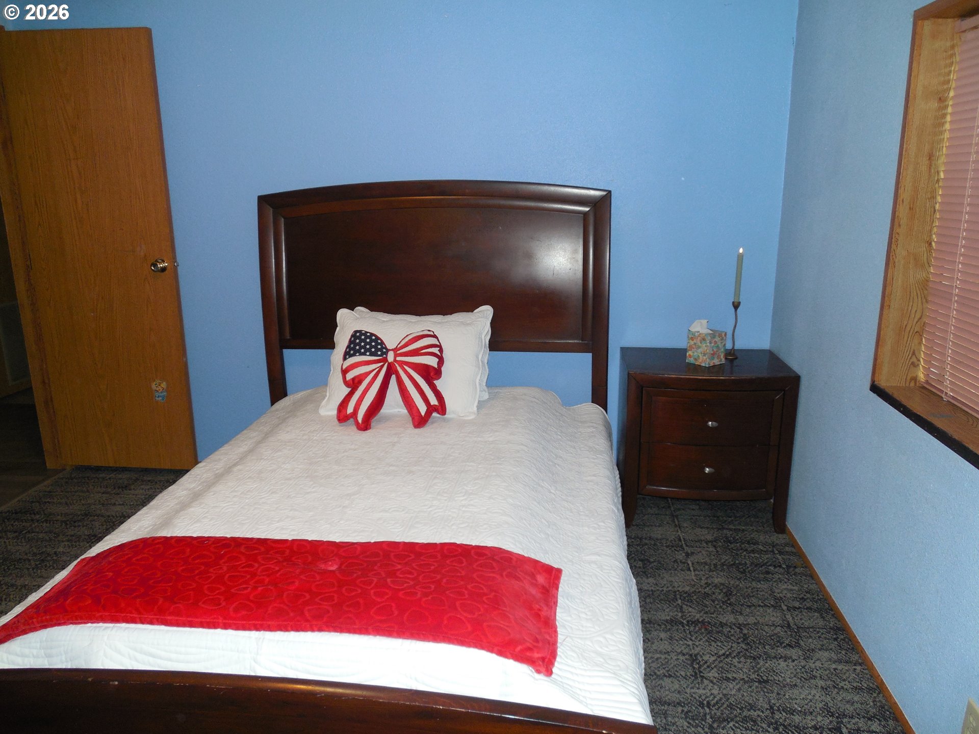41180 Southeast Kubitz Road Sandy, OR 97055 - Photo 24 of 35 a bedroom with a bed and a dresser
