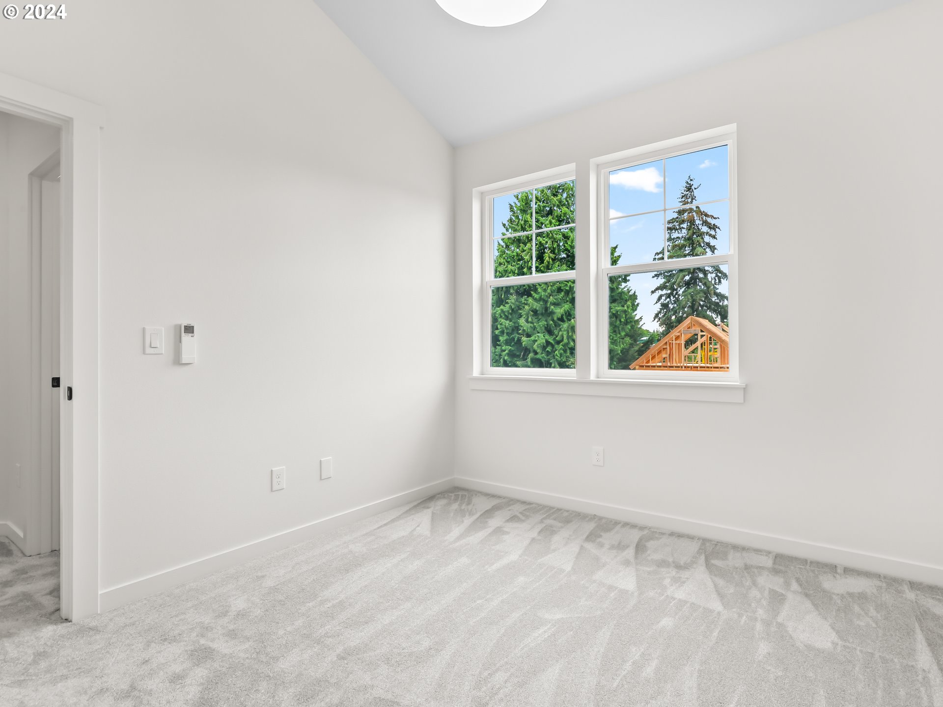 4636 Northeast Sumner Street Portland, OR 97218 - Photo 31 of 39 an empty room with windows