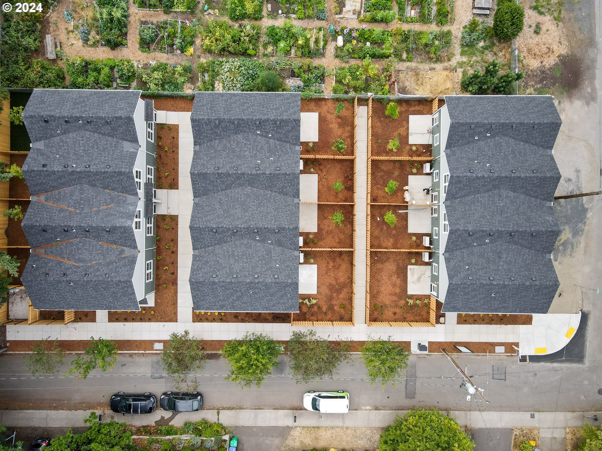 4636 Northeast Sumner Street Portland, OR 97218 - Photo 36 of 39 aerial view of a house with a yard and plants