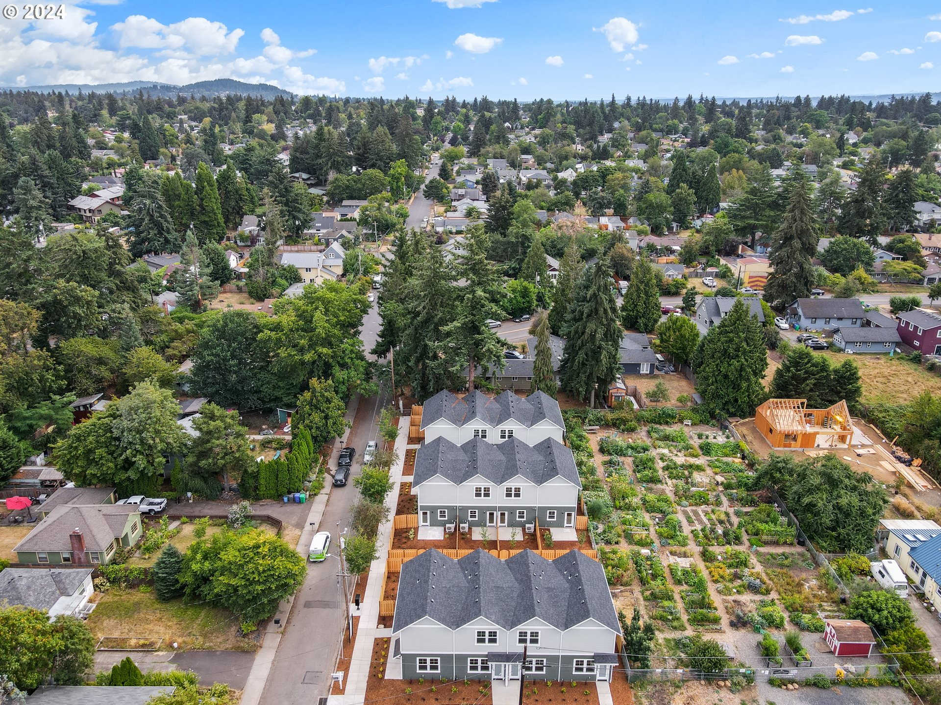4636 Northeast Sumner Street Portland, OR 97218 - Photo 38 of 39 an aerial view of residential houses with outdoor space and trees