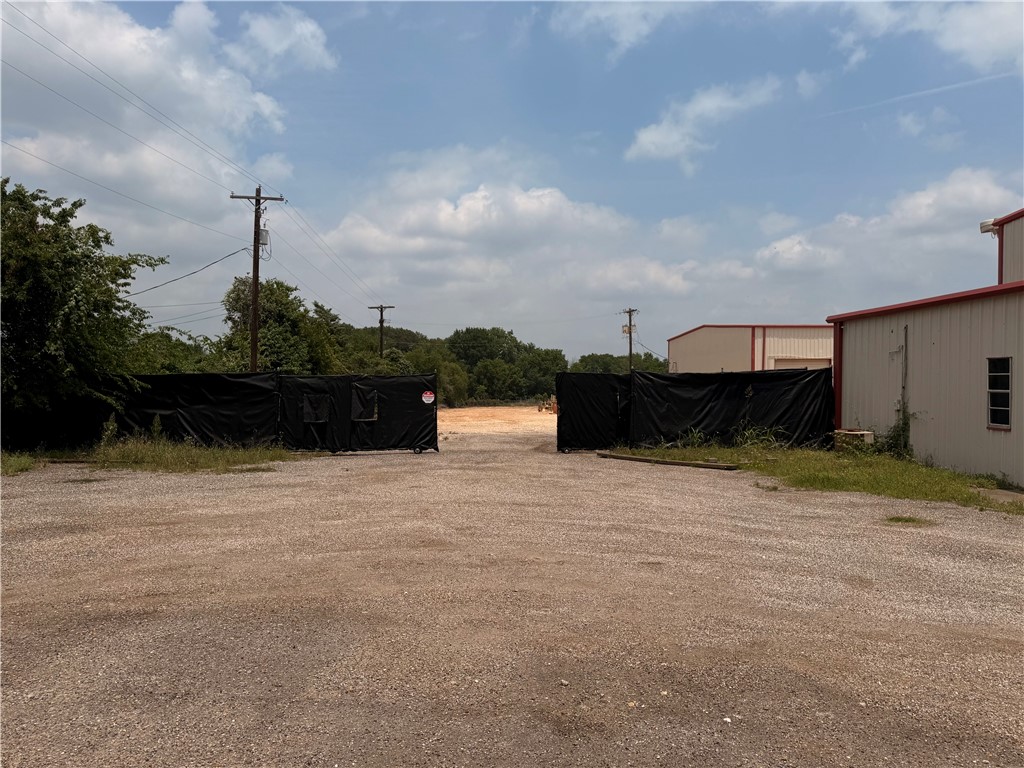 Tbd Clarks Lane Bryan, TX 77808 - Photo 9 of 12 a front view of a house with a yard