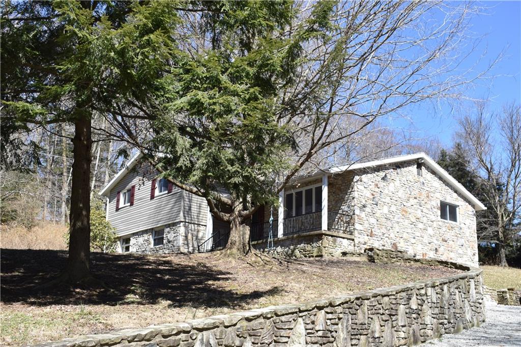 659 Ann Roberts Road Ligonier, PA 15658 - Photo 21 of 21 Beautiful stone retaining wall going up driveway!!