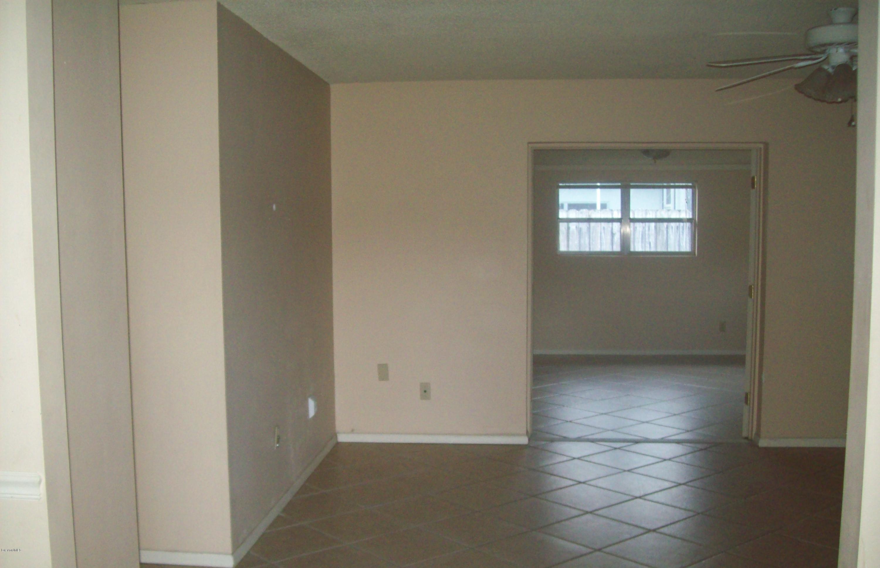 931 Kings Post Road Rockledge, FL 32955 - Photo 4 of 10 100_5963