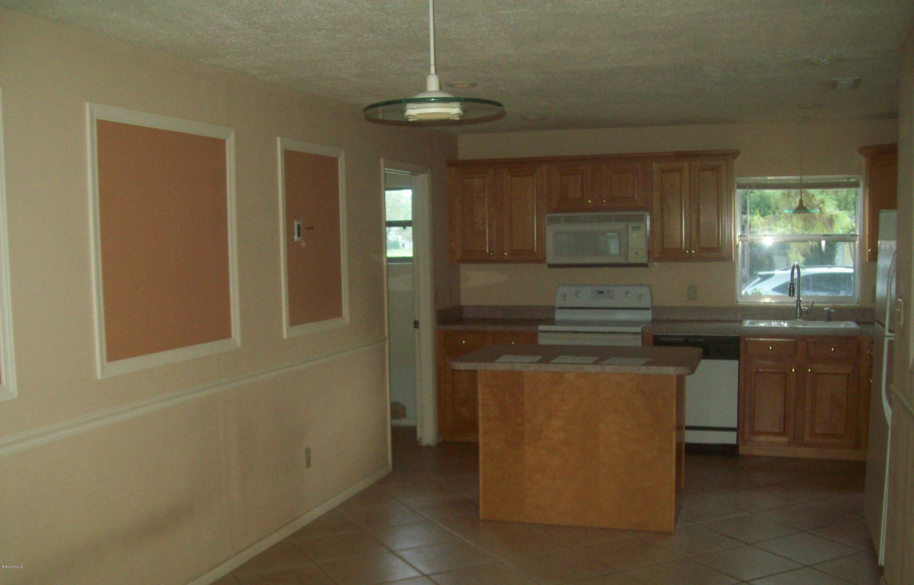 931 Kings Post Road Rockledge, FL 32955 - Photo 5 of 10 100_5964
