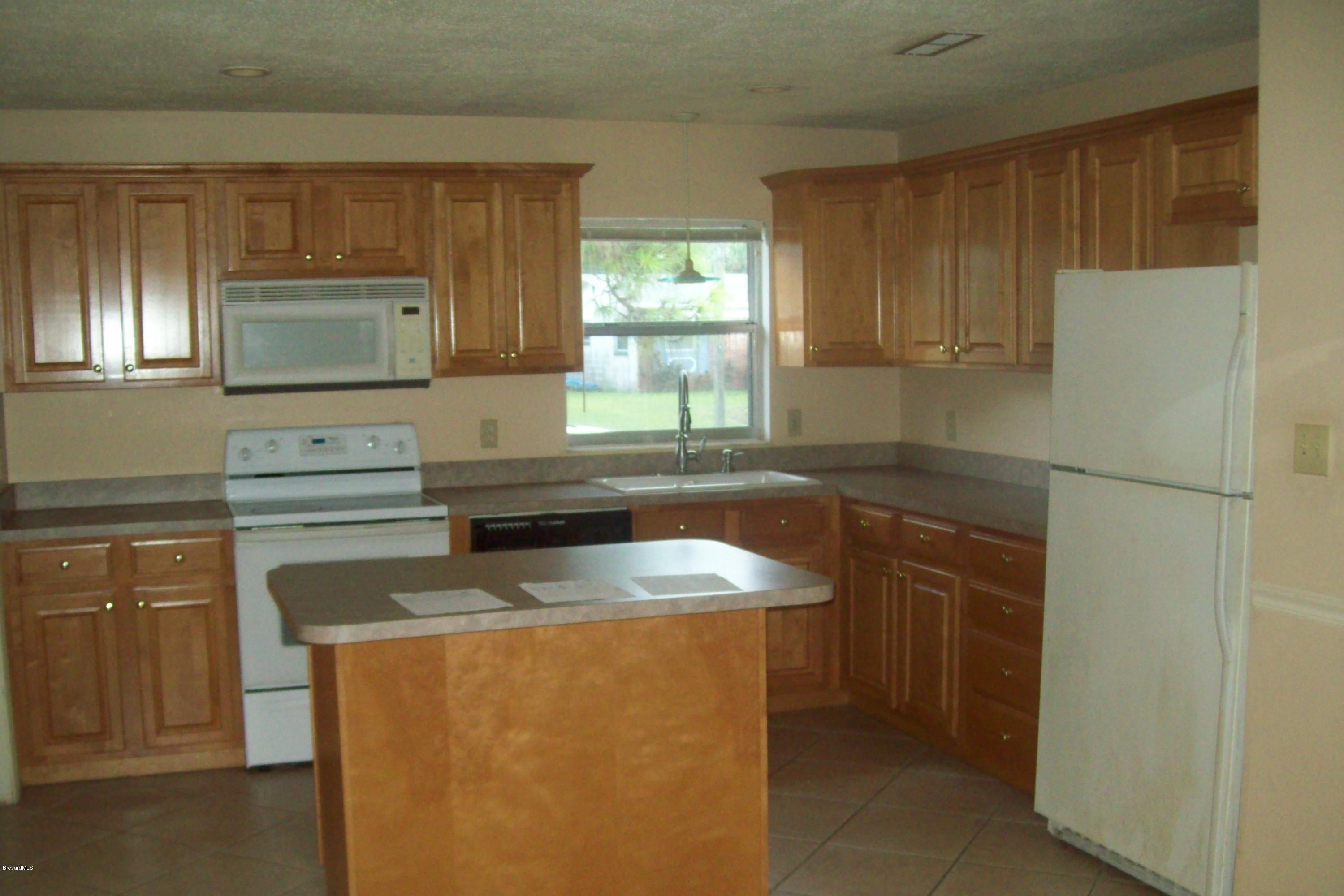 931 Kings Post Road Rockledge, FL 32955 - Photo 6 of 10 100_5965