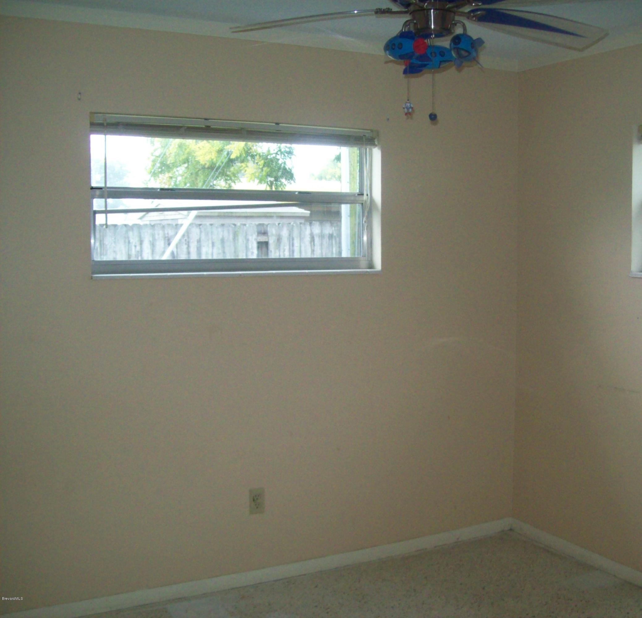 931 Kings Post Road Rockledge, FL 32955 - Photo 9 of 10 100_6005