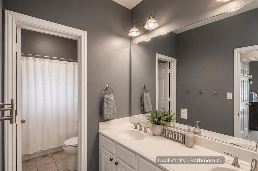 15 Trail Ridge Drive Melissa, TX 75454 - Photo 27 of 38 a bathroom with a sink and a mirror