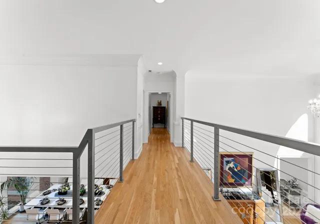 a view of a house with a yard patio and fire pit