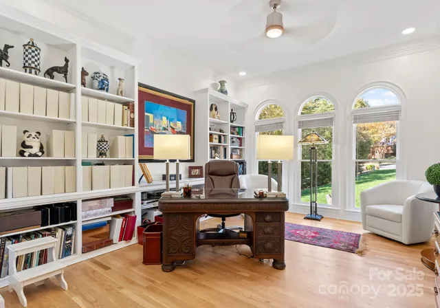 a kitchen with a sink counter top space appliances and cabinets