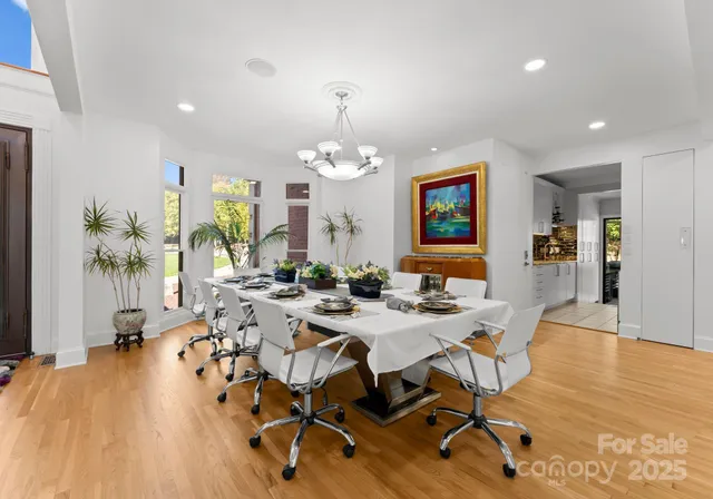 a living room with furniture fireplace and window