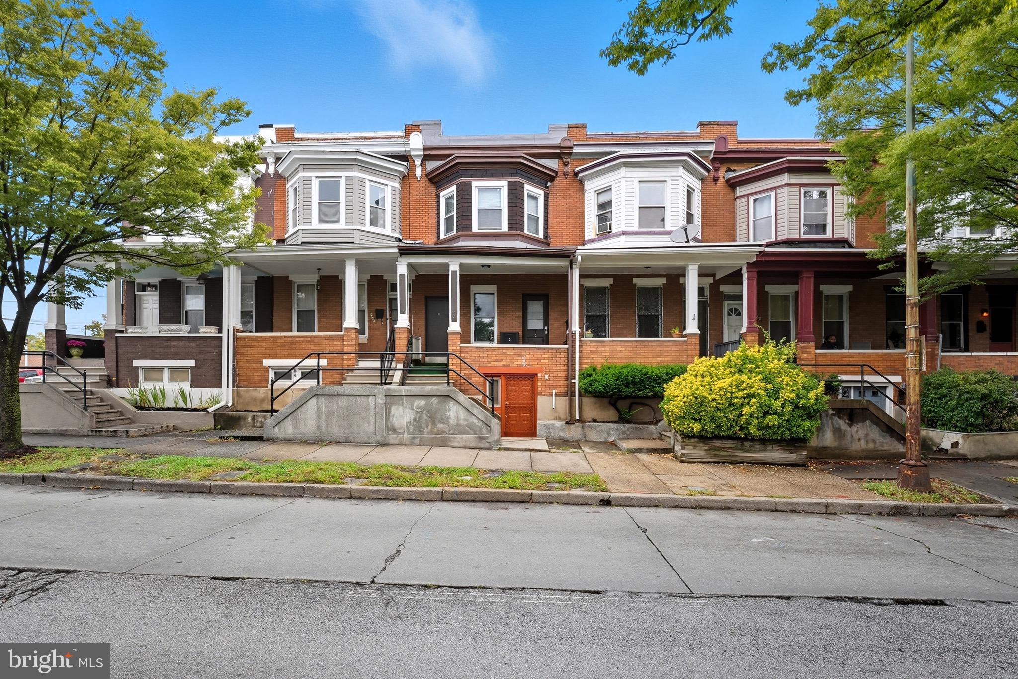 front view of a house with a small yard