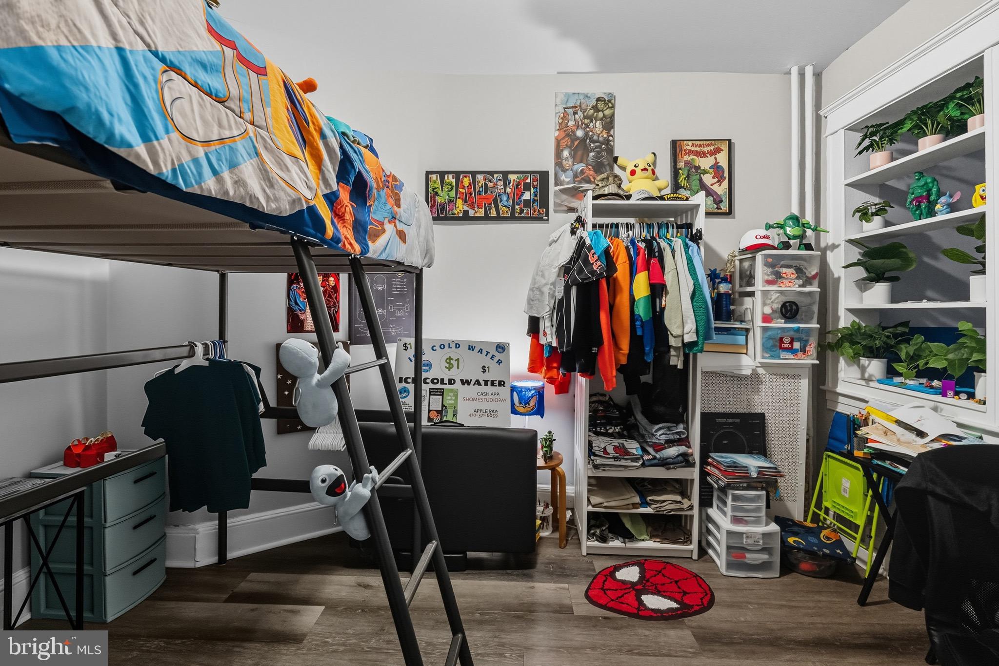 604 East 33rd Street Baltimore, MD 21218 - Photo 10 of 22 a view of walk in closet with clothes and shoes