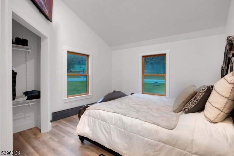 4435 Rudetown Road Hamburg, NJ 07419 - Photo 17 of 24 a bedroom with a bed and a window