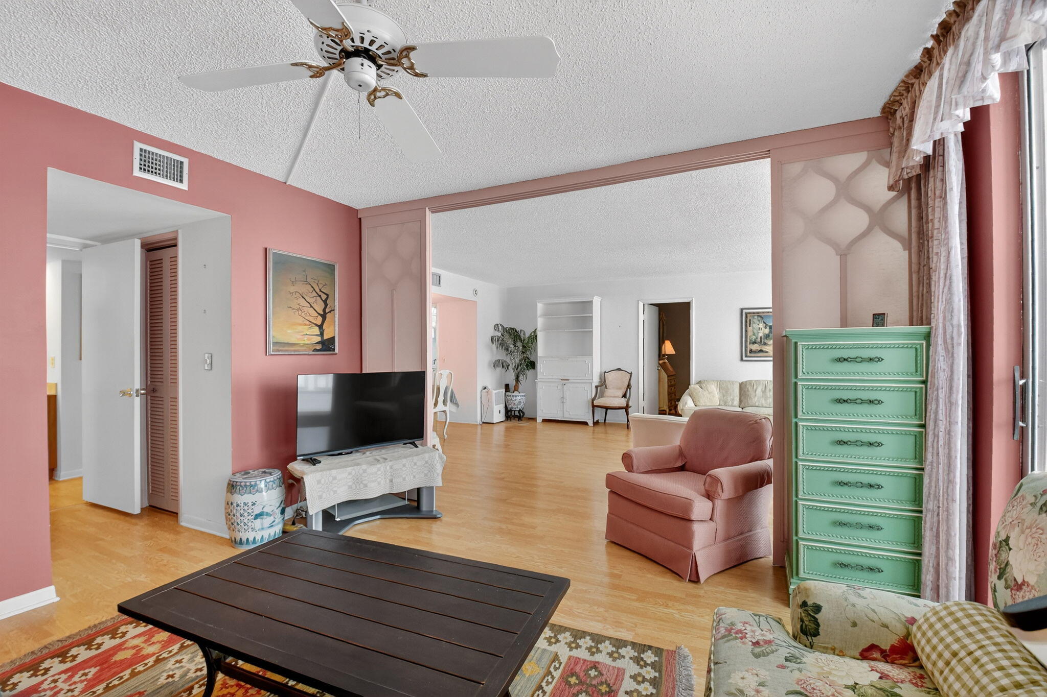 3570 South Ocean Boulevard, Unit 508 South Palm Beach, FL 33480 - Photo 18 of 47 a living room with furniture and a flat screen tv