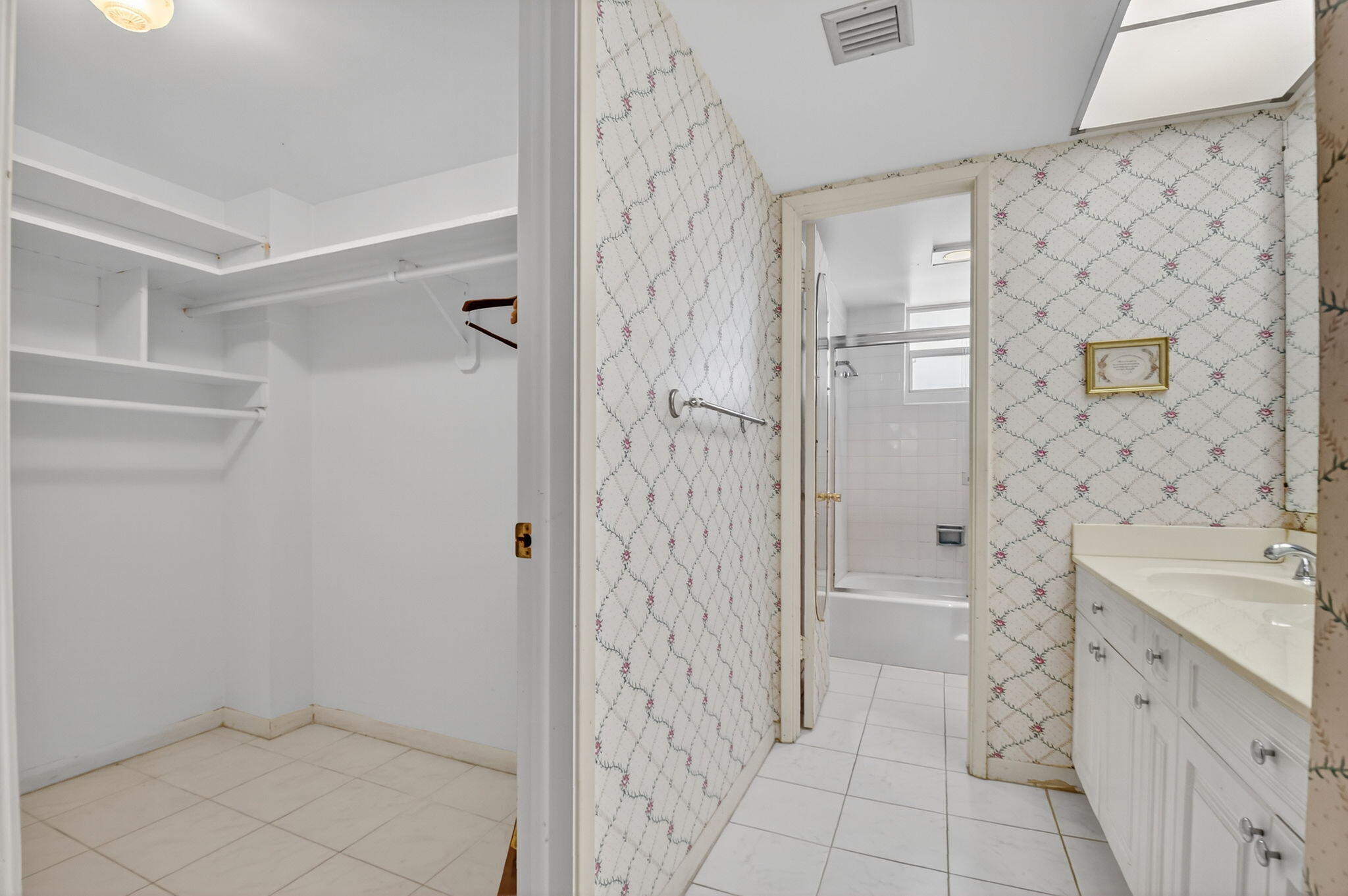 3570 South Ocean Boulevard, Unit 508 South Palm Beach, FL 33480 - Photo 26 of 47 a bathroom with a sink a toilet and shower