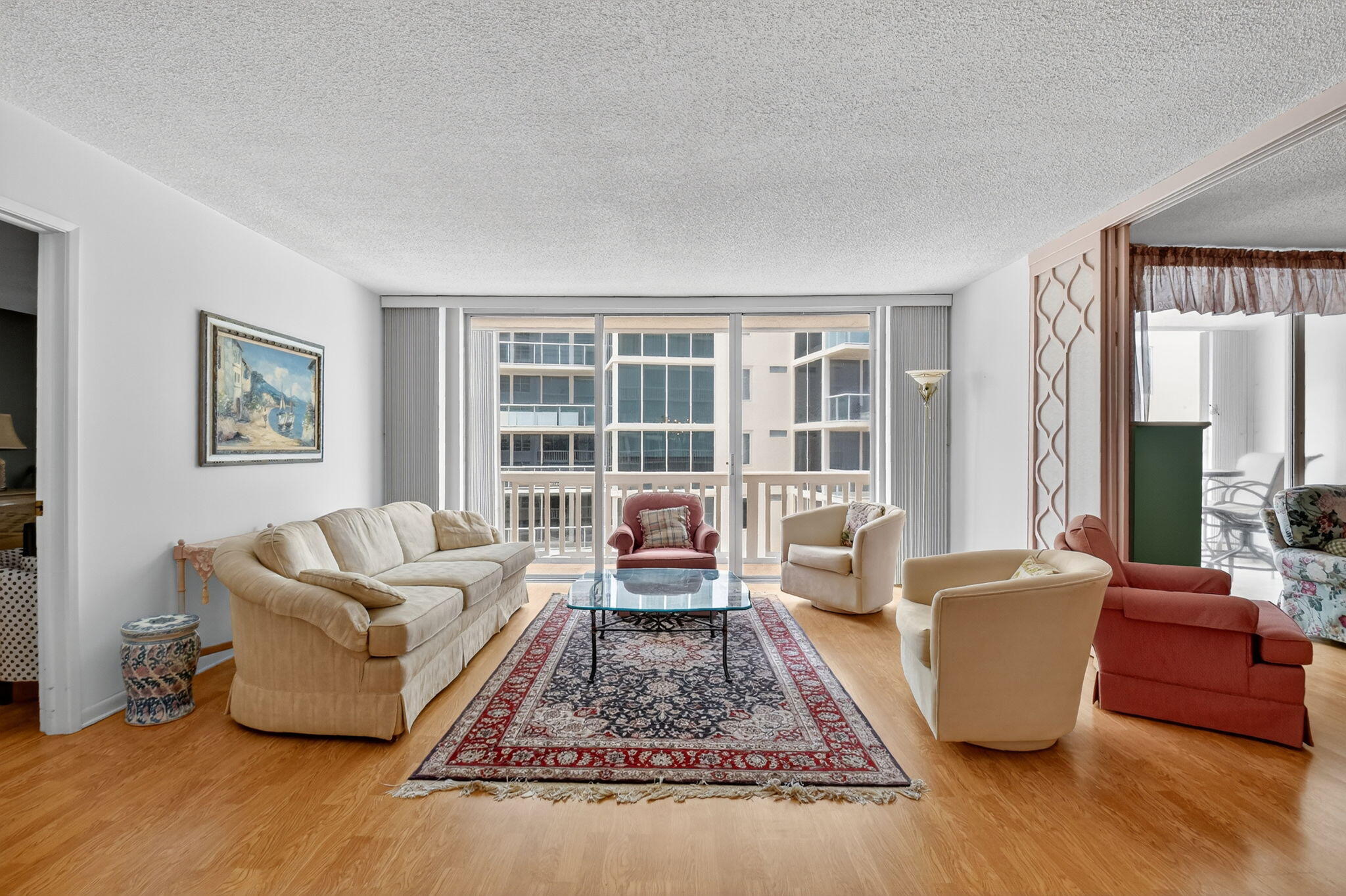 3570 South Ocean Boulevard, Unit 508 South Palm Beach, FL 33480 - Photo 9 of 47 a living room with furniture and a couch