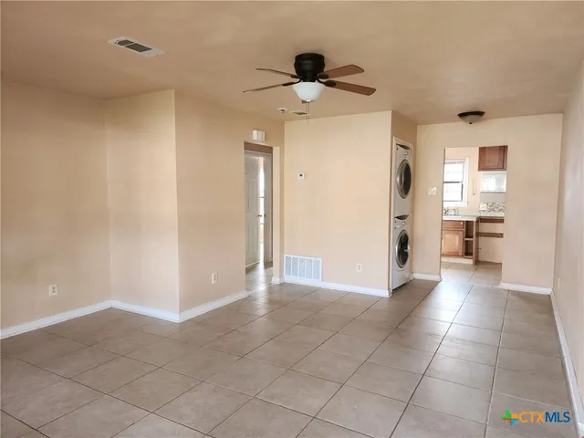 a view of a livingroom with a staircase