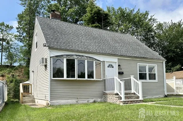 a house view with a backyard space