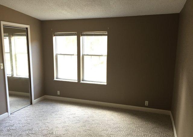350 Robbins Road DeFuniak Springs, FL 32433 - Photo 8 of 13 a view of an empty room with a window