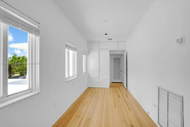 an empty room with a window