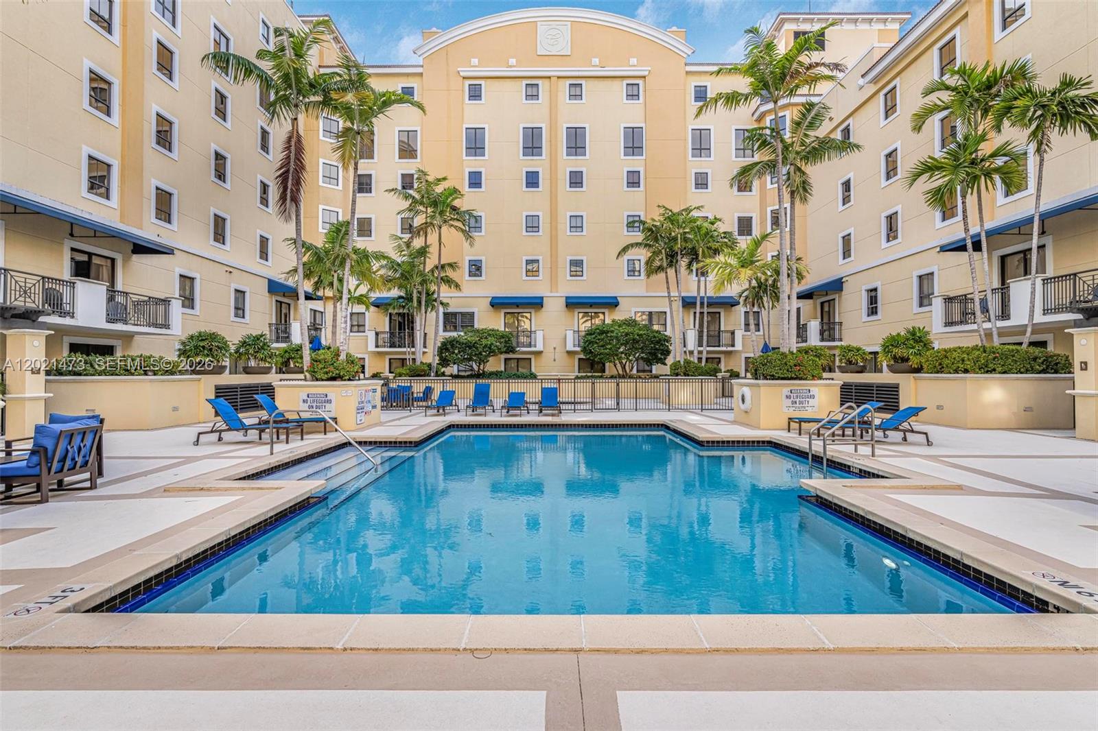 8395 Southwest 73rd Avenue, Unit 710 Miami, FL 33143 - Photo 26 of 32 a view of swimming pool with outdoor seating