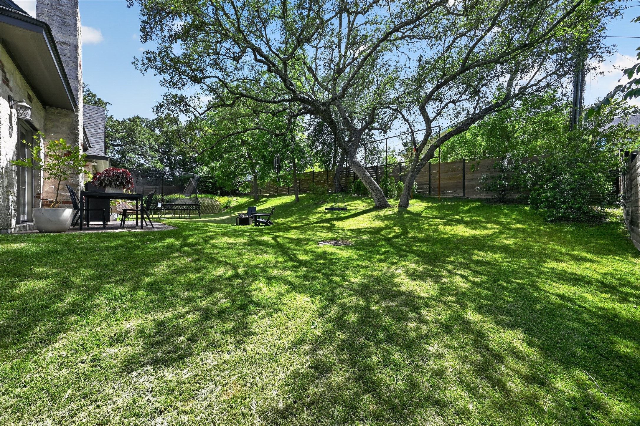 700 Willow Creek Road Salado, TX 76571 - Photo 35 of 39 Professionally refreshed landscaping, irrigation system, and recent fence with drive-through gate.