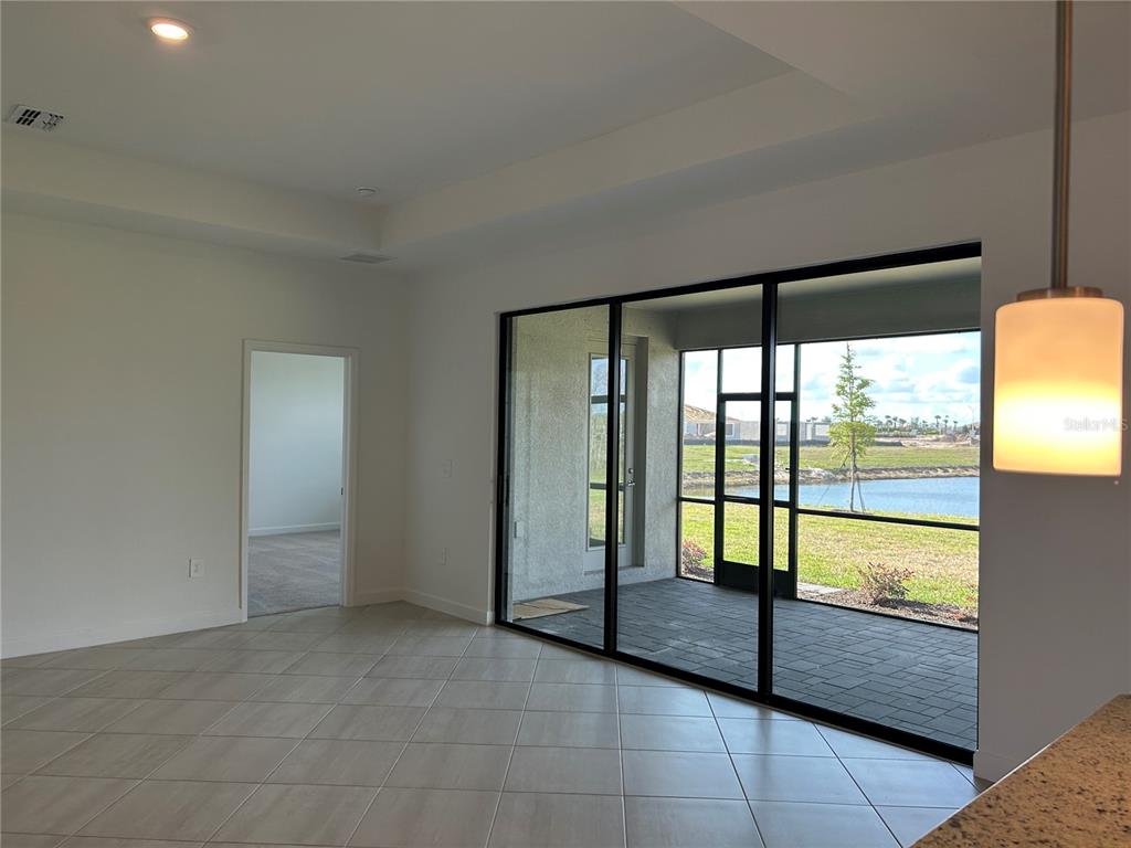 15513 White Linen Drive Lakewood Ranch, FL 34211 - Photo 13 of 35 a view of an empty room with a large window